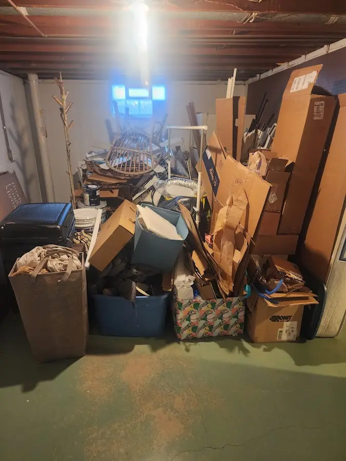 Roll-off dumpster container at job site for Construction Dumpster Rental in Highlands